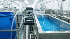 Peristaltic pump dosing chemicals into an electroplating bath in a surface finishing facility