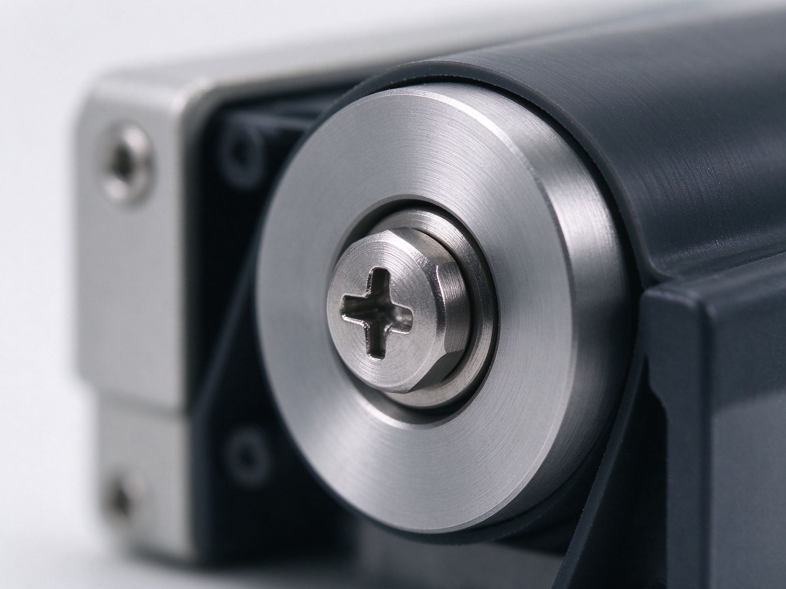 Close-up of an adjustable occlusion screw on a peristaltic pump head